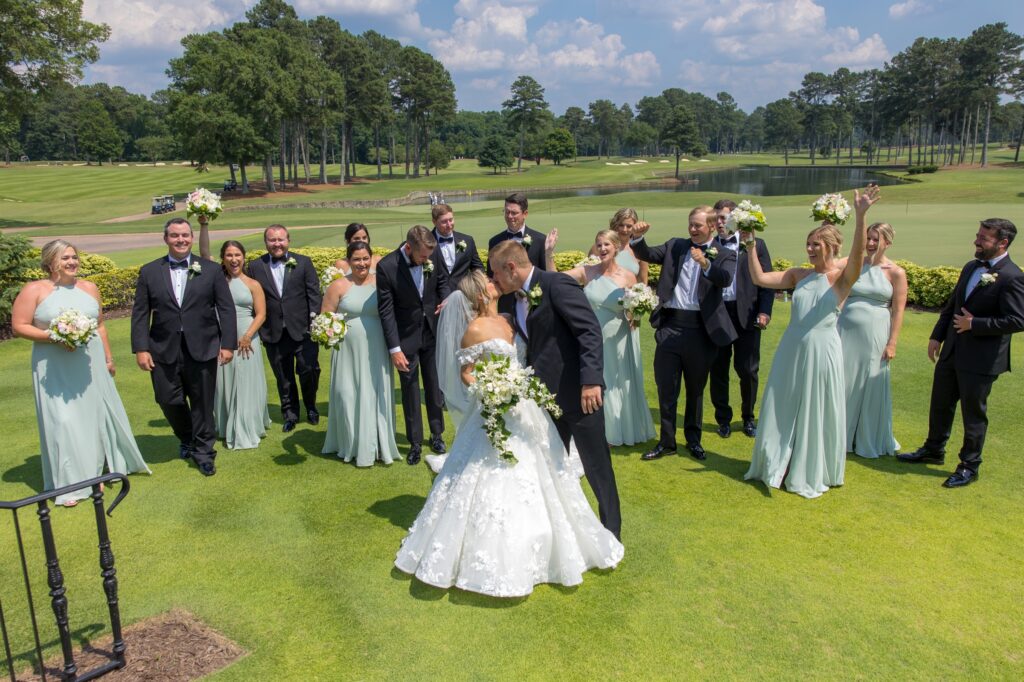 Bride and Groom kiss at Atlanta Athletic Club Wedding